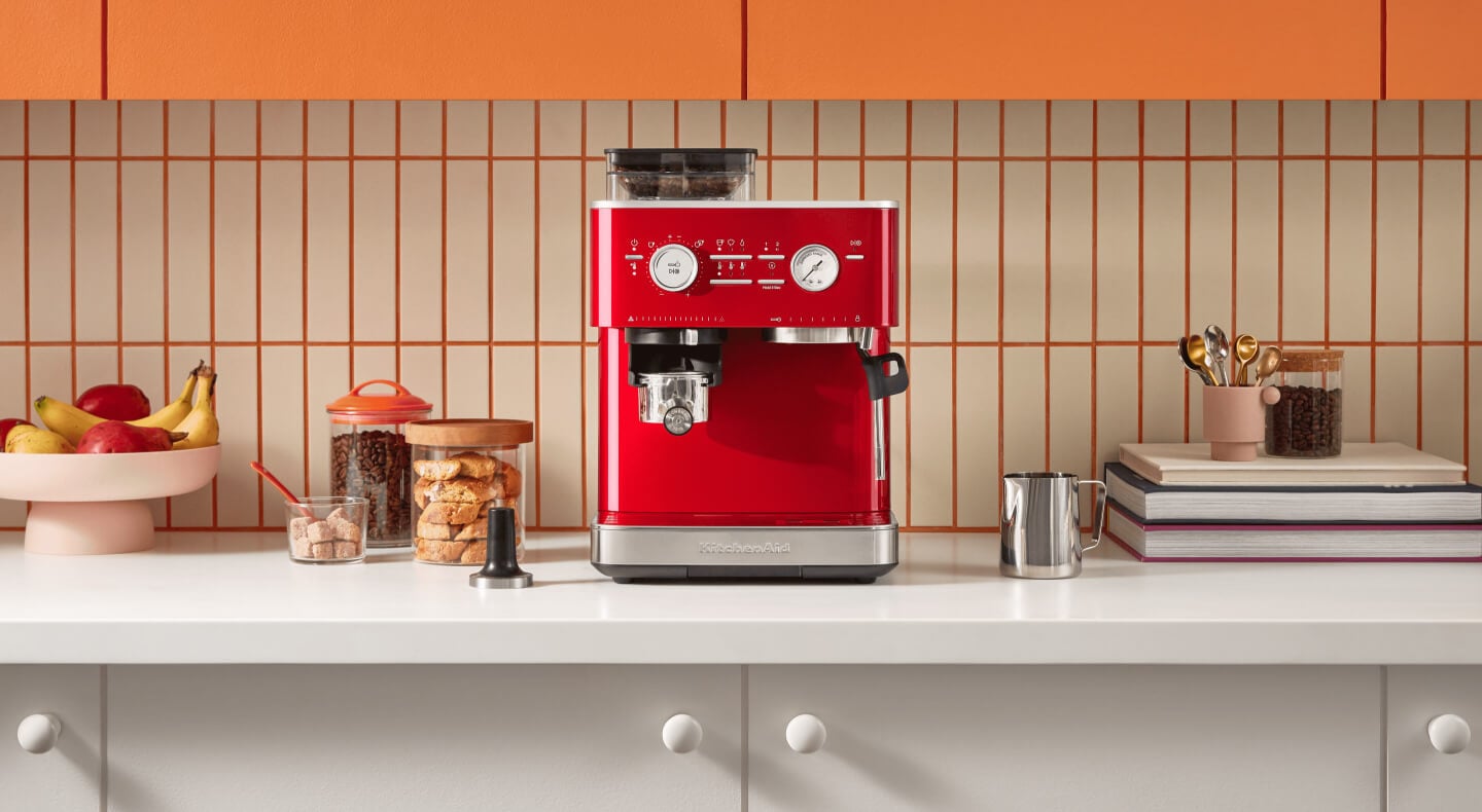 Red KitchenAid® Semi-Automatic Espresso Machine in a bright, modern kitchen Red KitchenAid® Semi-Automatic Espresso Machine in a bright, modern kitchen