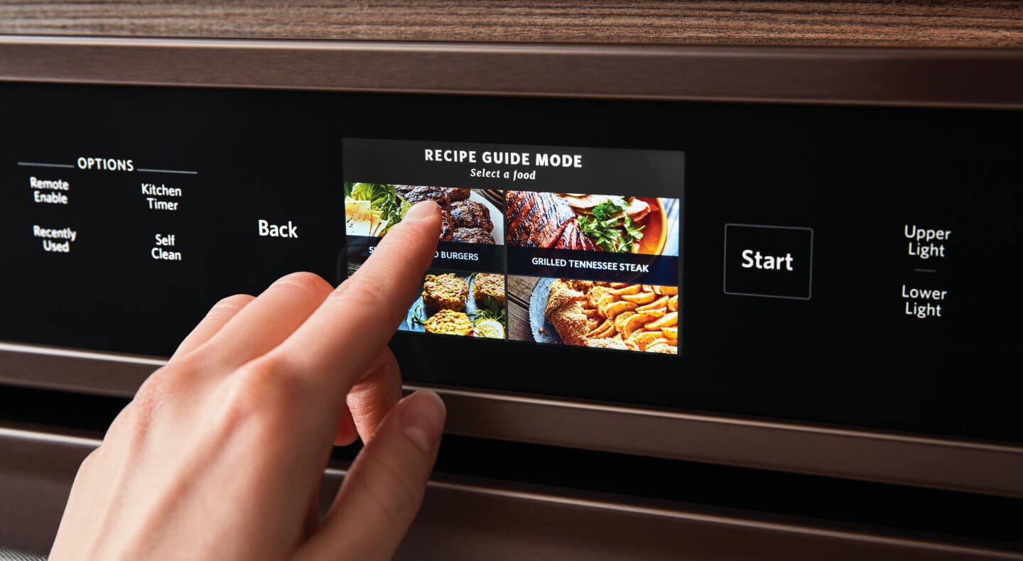 A person selecting a recipe guide mode for a convection bake setting