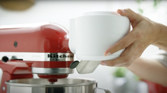 A Sifter + Scale Attachment from KitchenAid brand.