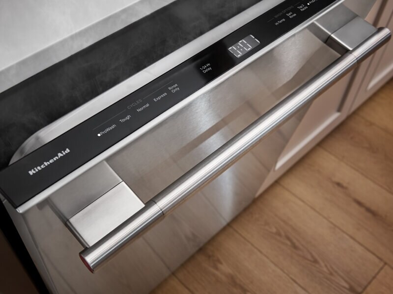 A dishwasher door slightly open