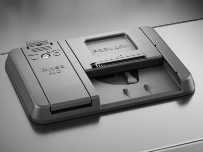 Close up image of a dishwasher detergent dispenser 