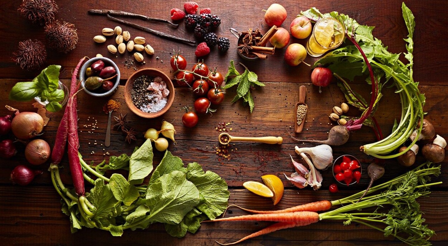 Various vegetables, fruits, herbs and spices on wooden table Various vegetables, fruits, herbs and spices on wooden table