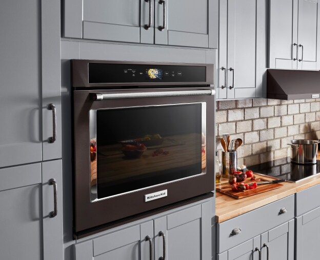 KitchenAid® wall oven among blue cabinets 