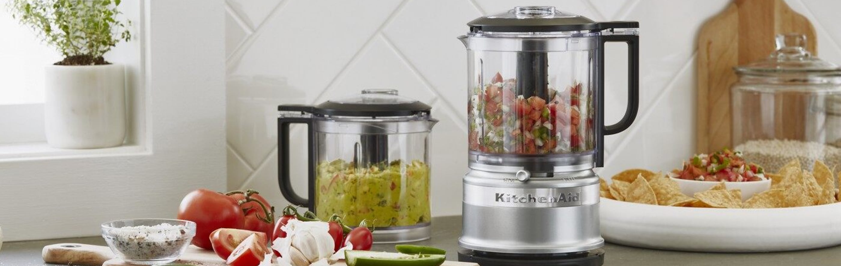 Silver KitchenAid® food processor on kitchen counter
