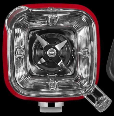 A top-down view of a KitchenAid® blender, looking down at the blades. A top-down view of a KitchenAid® blender, looking down at the blades.