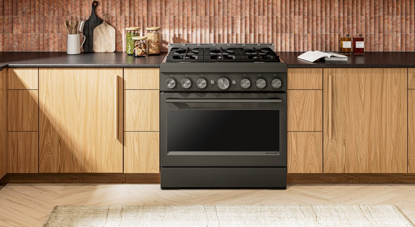 A kitchen space with a commercial style KitchenAid® Gas Range