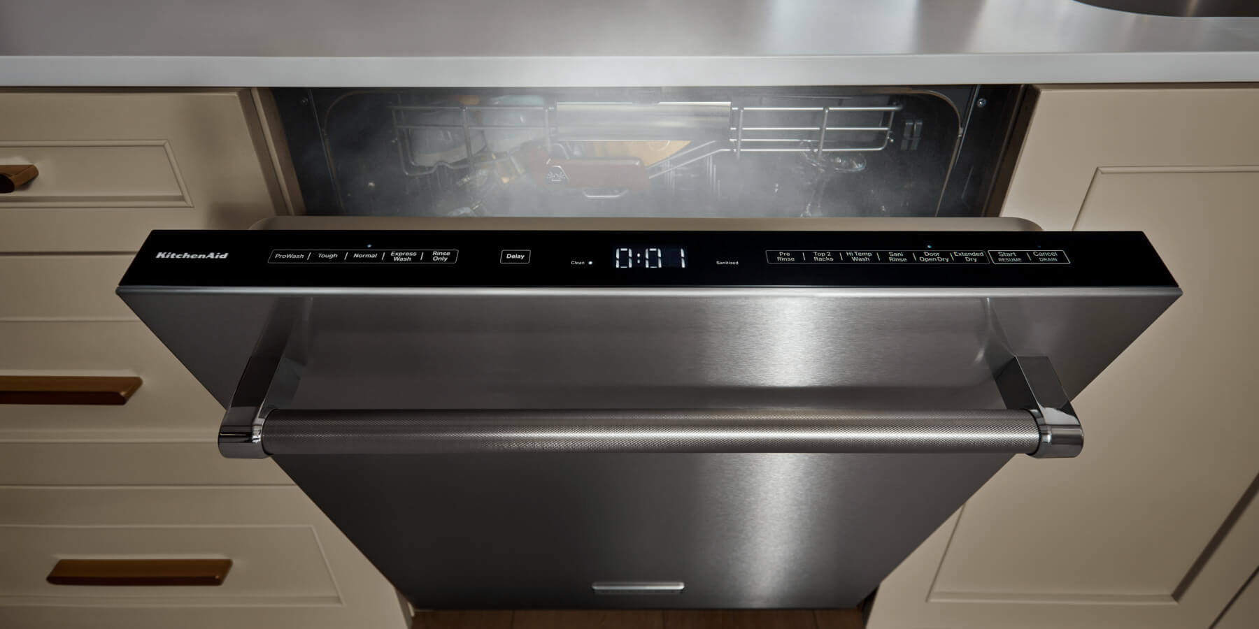 Top-control dishwasher door cracked open with steam coming out Top-control dishwasher door cracked open with steam coming out