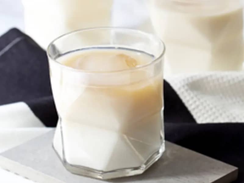 Glass of white tea with milk