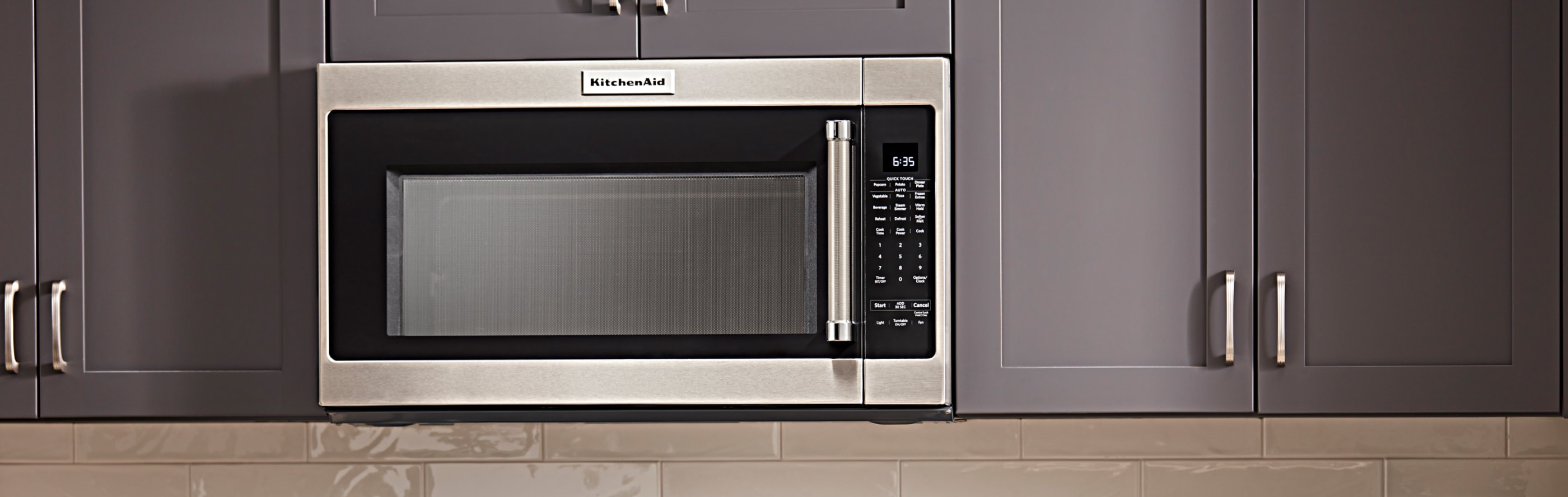 Over-the-range microwave in grey cabinets
