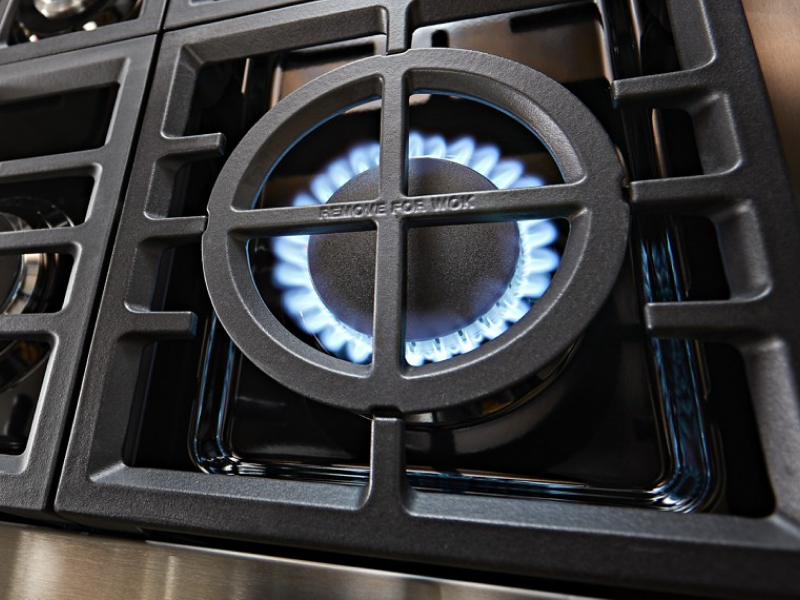 A gas stovetop with two activated burners A gas stovetop with two activated burners