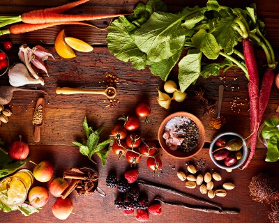 Assorted vegetables on a wooden cutting board