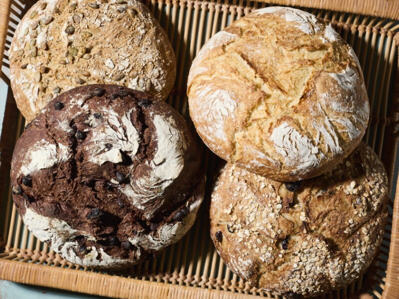 Round loaves of bread in basket Round loaves of bread in basket