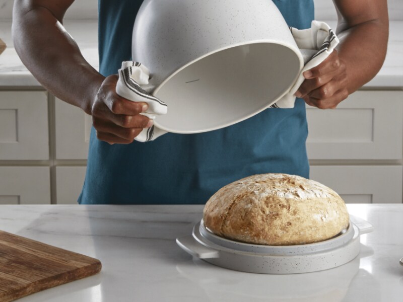 Man using the KitchenAid® Bread Bowl for fresh-baked bread Man using the KitchenAid® Bread Bowl for fresh-baked bread