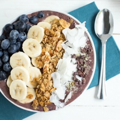 Acai bowl topped with fruit and granola