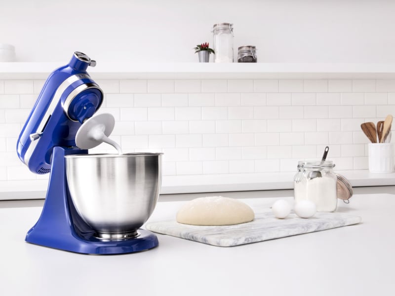 A KitchenAid® stand mixer with a dough hook attachment