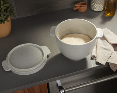 Bread dough inside a KitchenAid® Bread Bowl with Lid