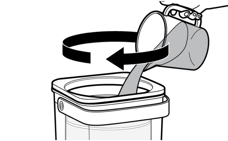 Hand pouring water into cold brew coffee maker