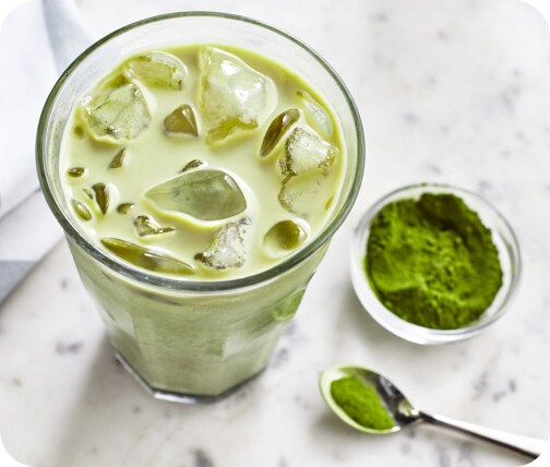 Looking down on a glass of ice matcha coffee