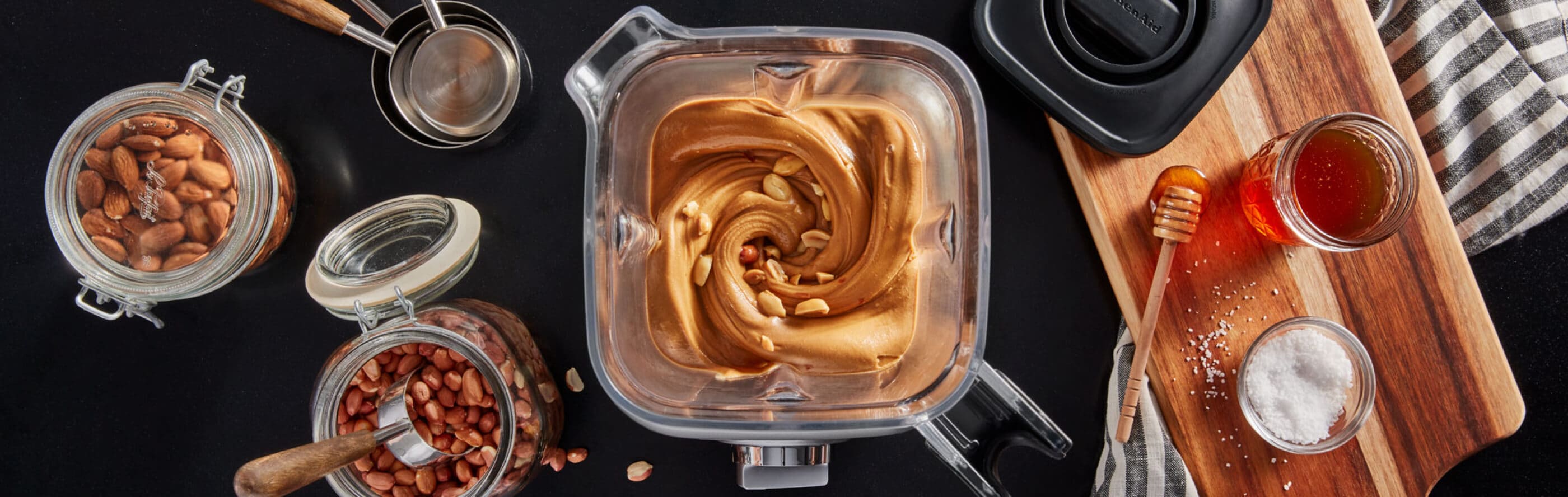 Blender filled with homemade peanut butter