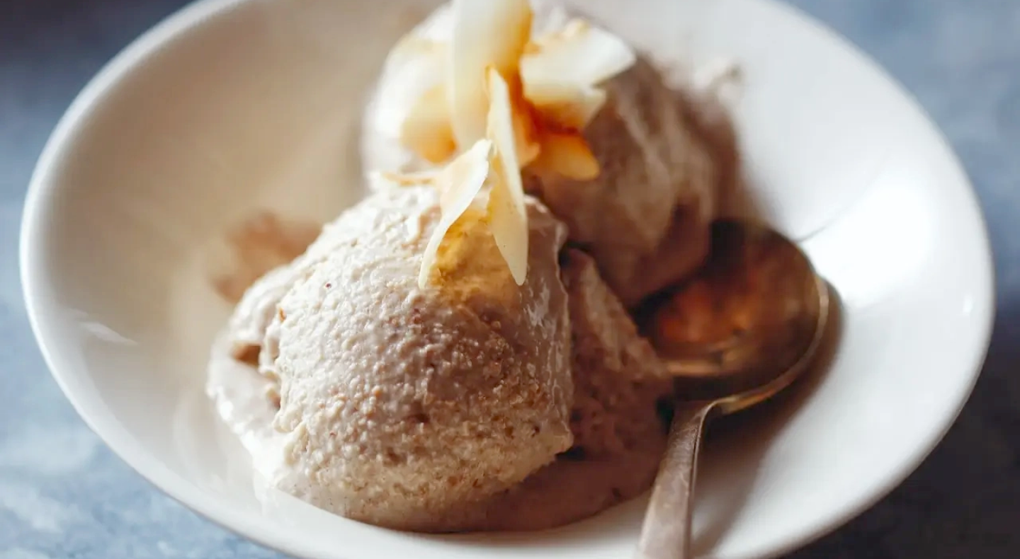 A dish of toasted coconut nice cream A dish of toasted coconut nice cream