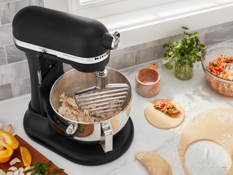 Making empanadas with shredded meat from a stand mixer Making empanadas with shredded meat from a stand mixer