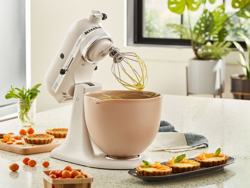 KitchenAid® stand mixer next to mini-quiches on countertop KitchenAid® stand mixer next to mini-quiches on countertop