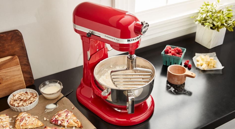 KitchenAid® pastry beater in bowl of KitchenAid® stand mixer next to homemade scones KitchenAid® pastry beater in bowl of KitchenAid® stand mixer next to homemade scones