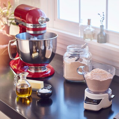 KitchenAid® stand mixer on counter with baking ingredients