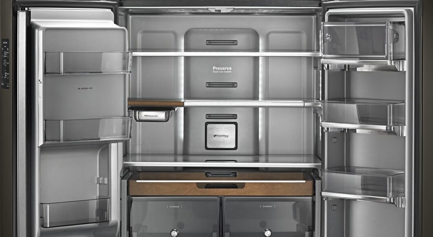An empty KitchenAid® refrigerator. An empty KitchenAid® refrigerator.