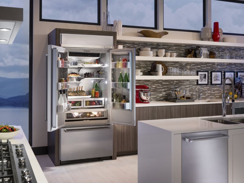 Refrigerator open to show contents Refrigerator open to show contents