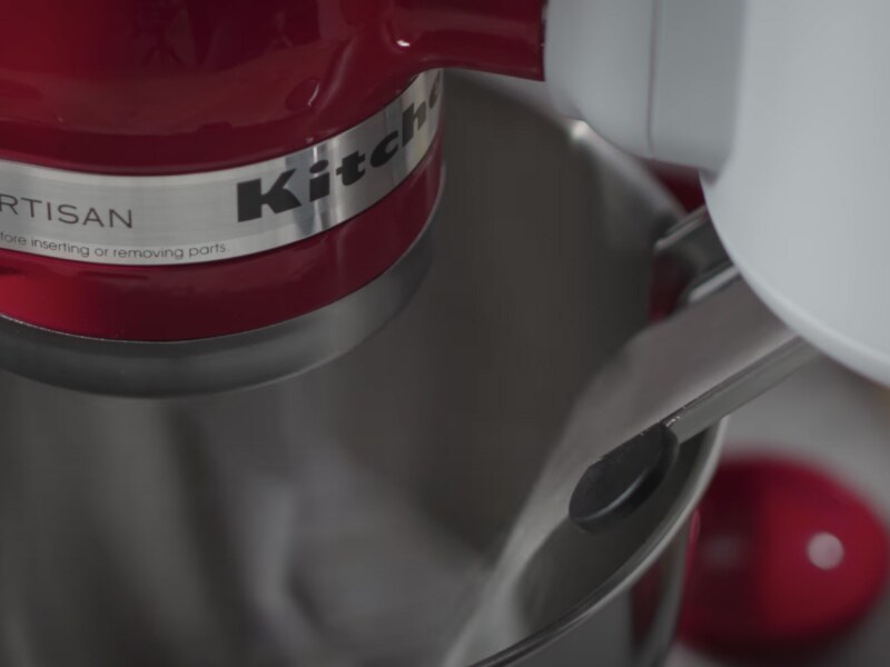 A close up of a mixer bowl