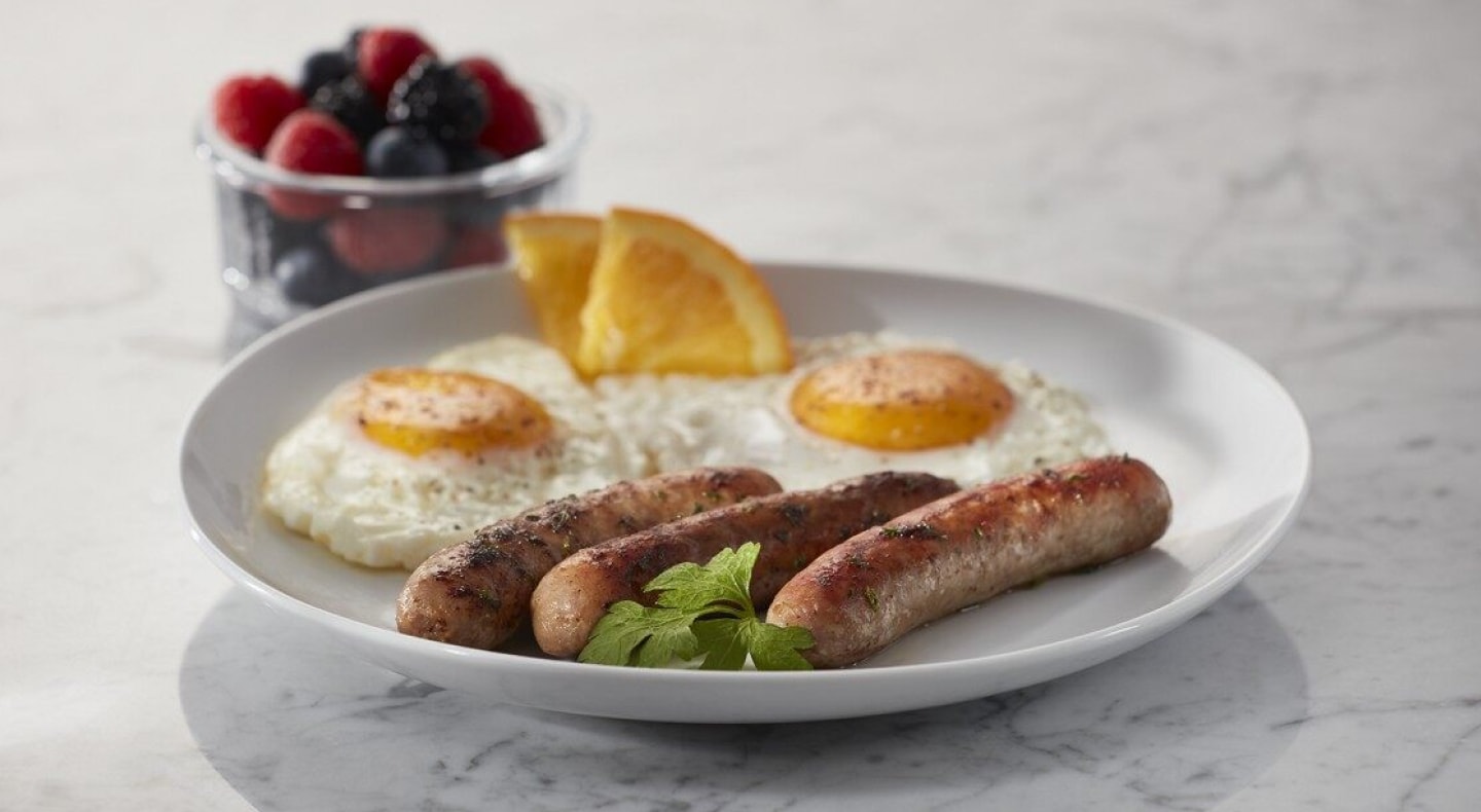 Sausages on a plate with eggs Sausages on a plate with eggs