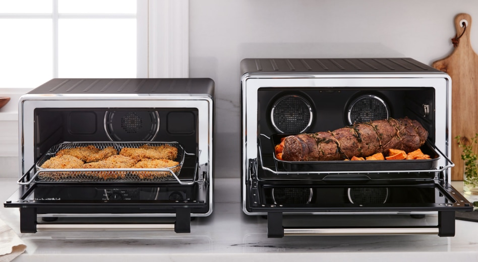 Two countertop ovens side-by-side featuring different meals Two countertop ovens side-by-side featuring different meals