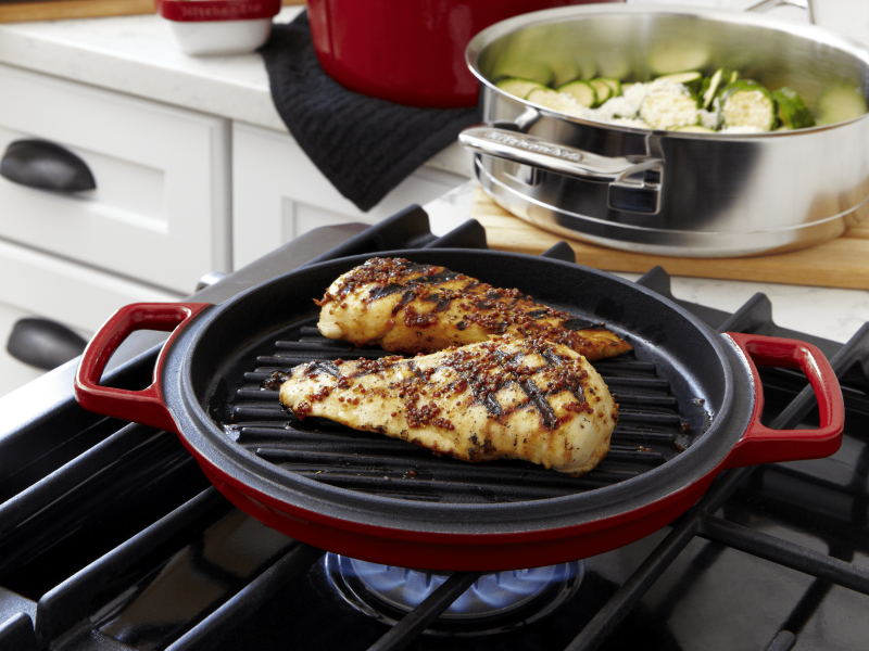 Chicken cooking on a stove