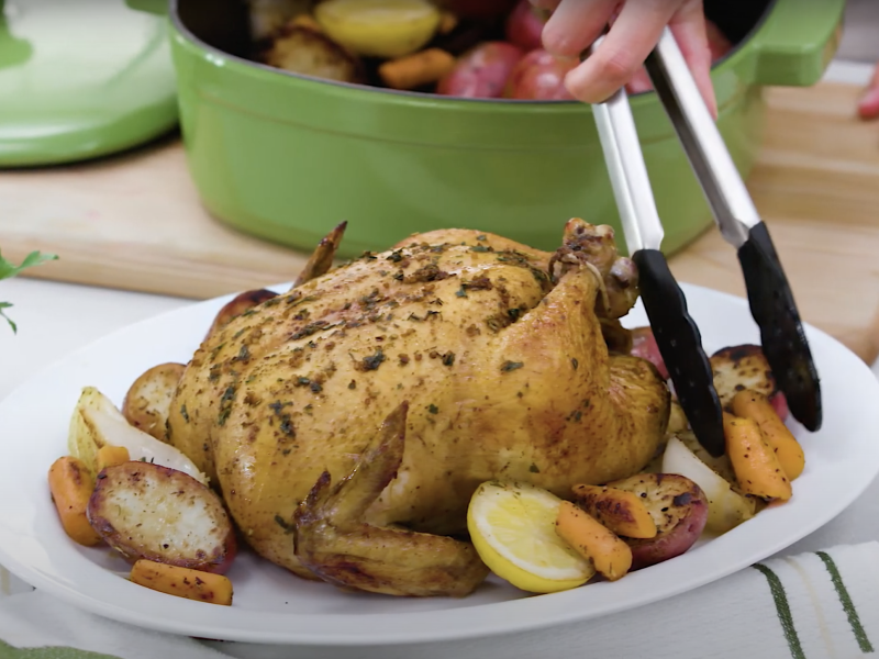 Whole roasted chicken on a plate