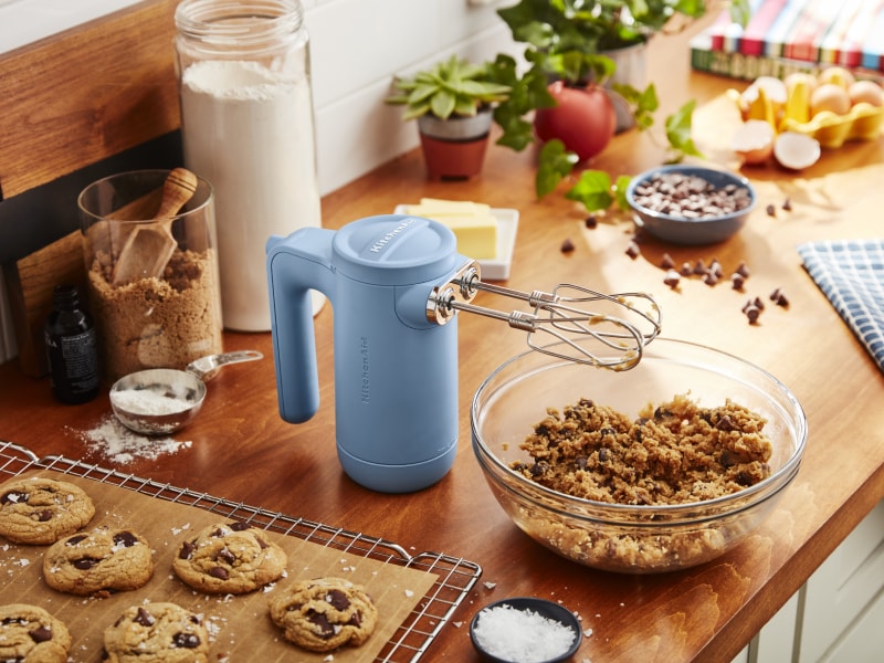 Cordless KitchenAid® hand mixer with cookie dough Cordless KitchenAid® hand mixer with cookie dough