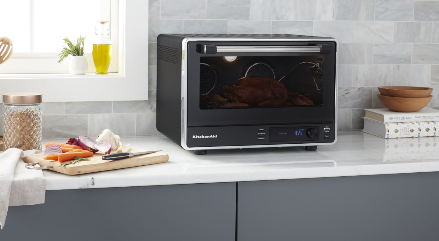 A meal cooking in a KitchenAid® Countertop Oven A meal cooking in a KitchenAid® Countertop Oven