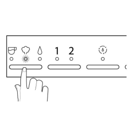 Hand pressing steam mode button