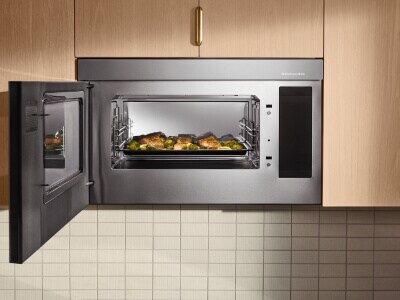 Open microwave with food inside