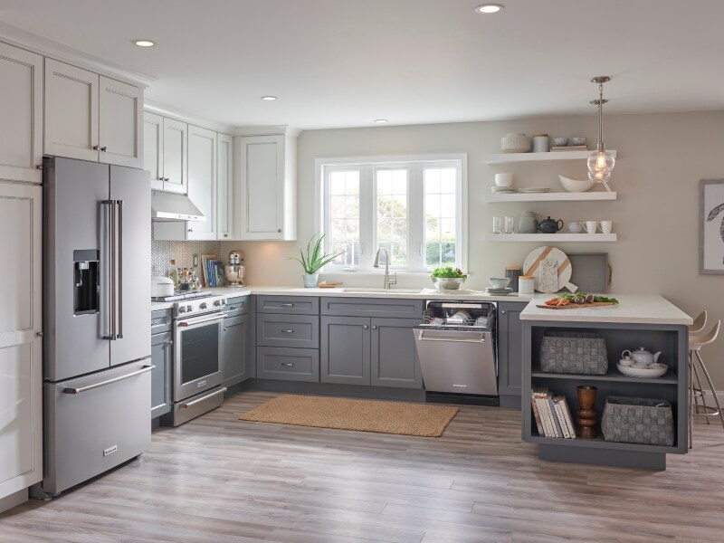 Gray and white kitchen with stainless steel KitchenAid® appliances