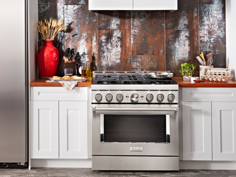 Stainless steel KitchenAid® gas range and side-by-side refrigerator