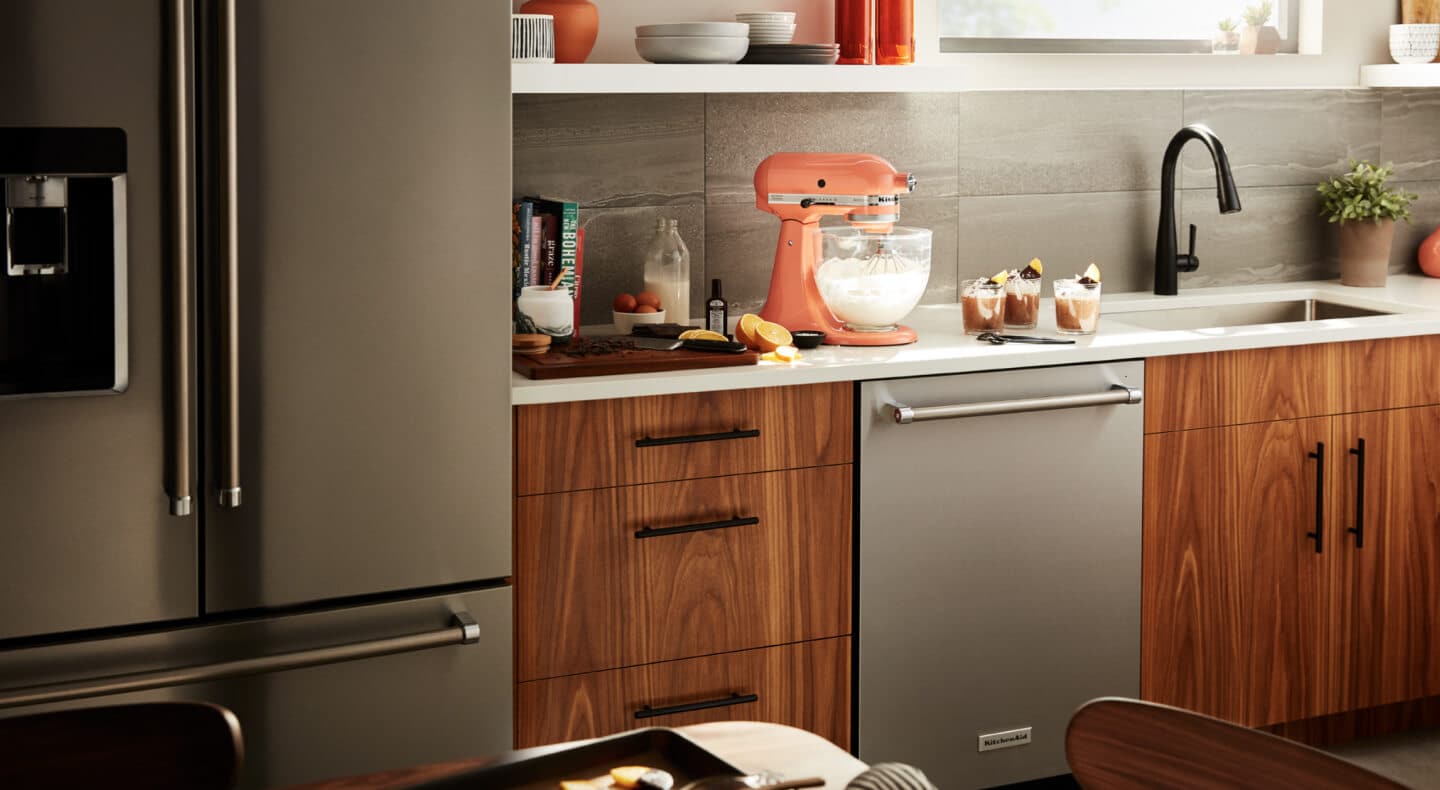 Orange KitchenAid® stand mixer on countertop Orange KitchenAid® stand mixer on countertop