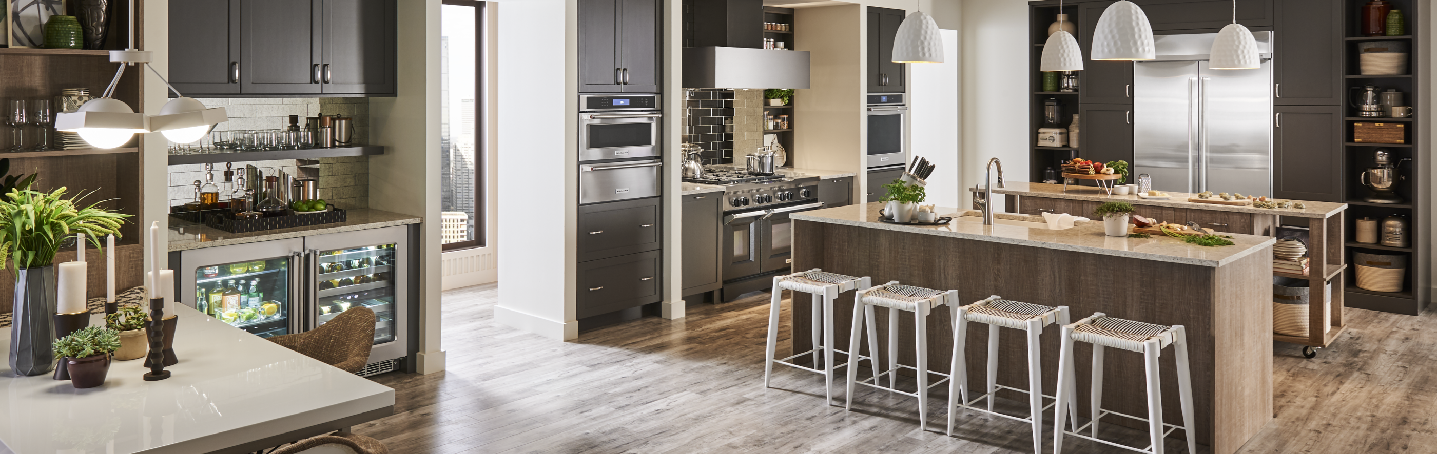 Large kitchen with built-in appliances and two islands