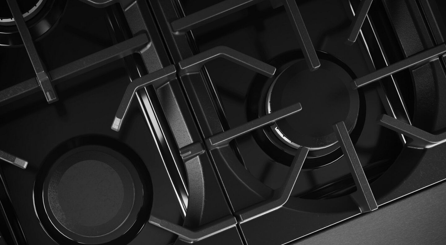 Overhead image of grates on a gas range