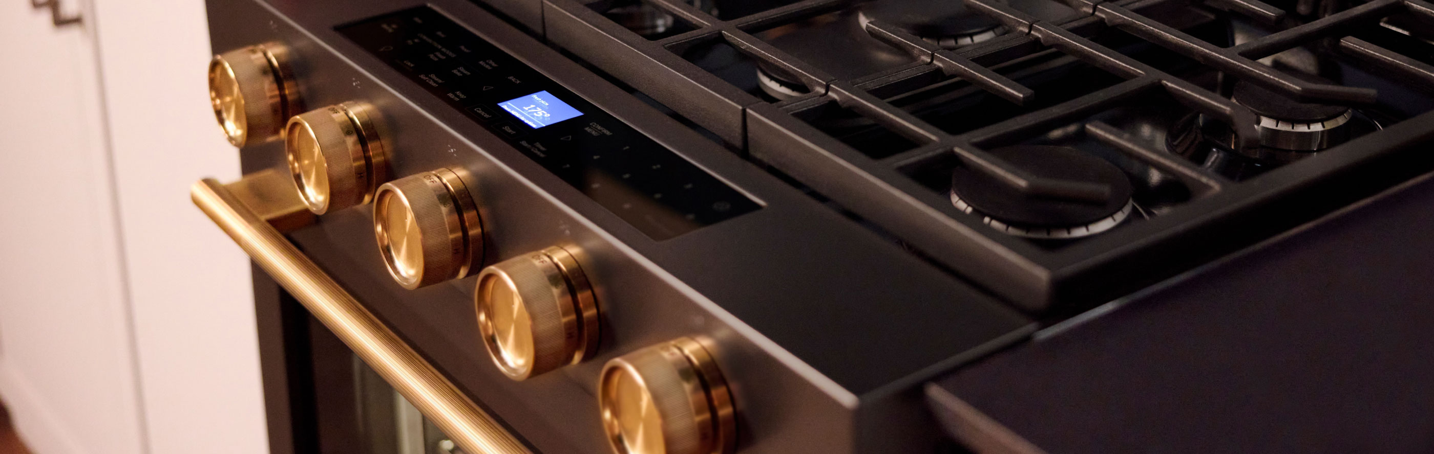 Close-up of a KitchenAid® range’s knobs