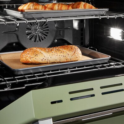 Food on baking sheet in an oven