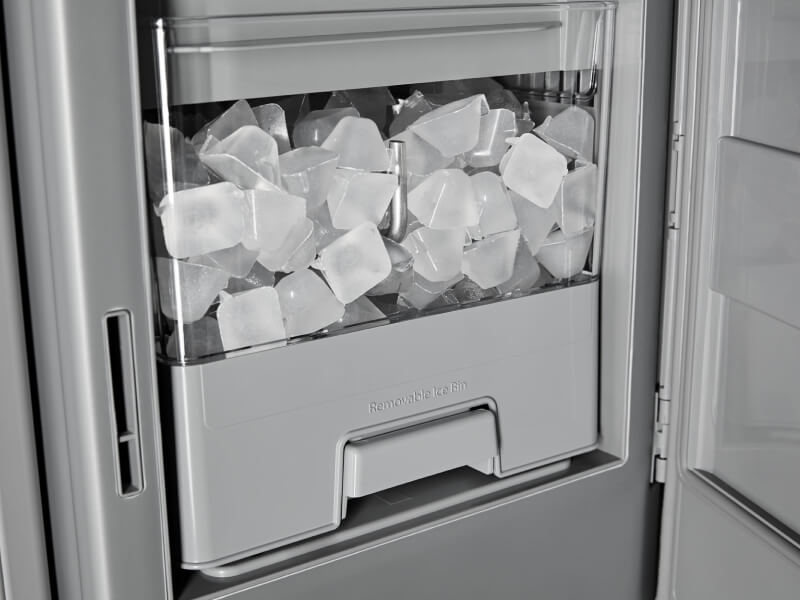 Built-in ice maker filled with ice