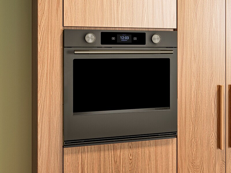 Kitchen cabinetry with a KitchenAid® smart electric wall oven