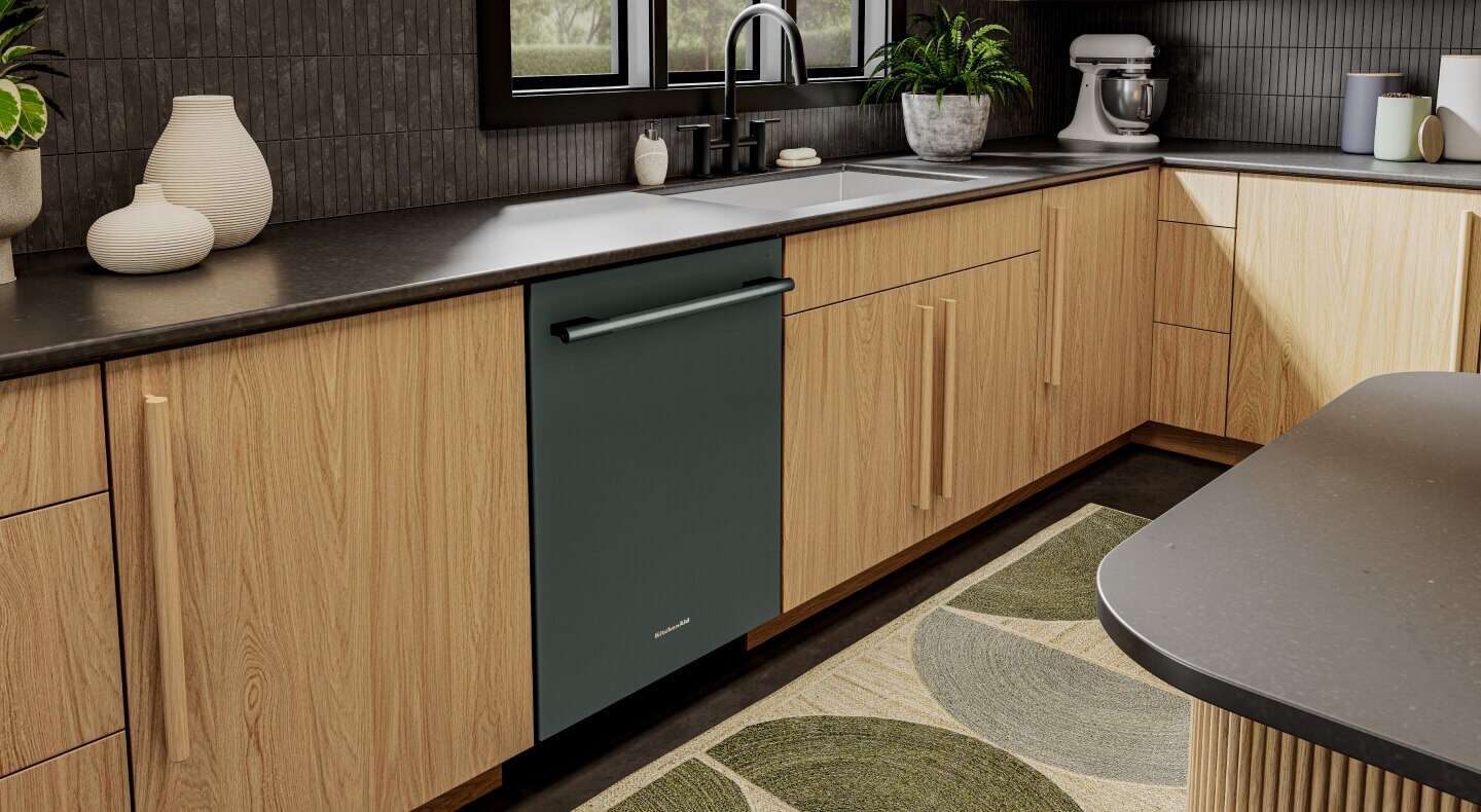 Dishwasher in a modern kitchen with brown cabinets