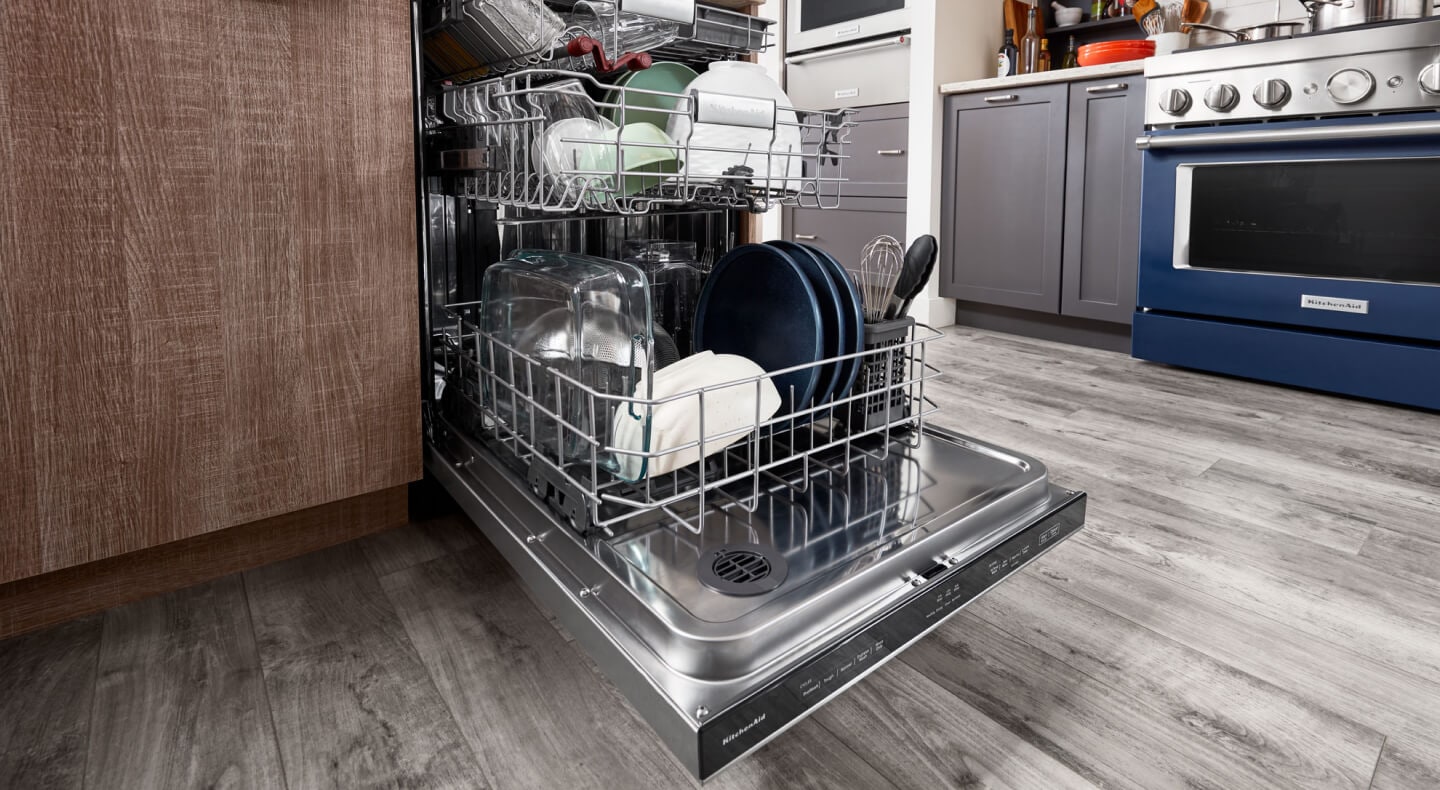 A full open dishwasher A full open dishwasher